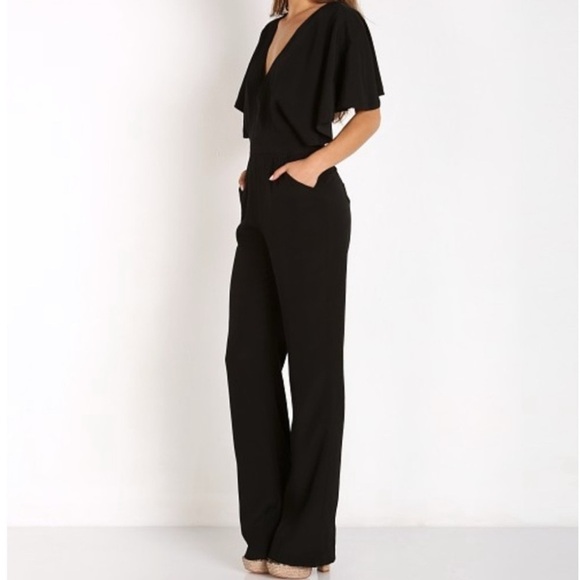 The Jetset Diaries Jumpsuit size XS Sahara Black Exposed Back Flutter Vneck Sexy - Picture 2 of 13
